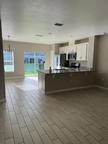 $2,100 | 1623 Mirabella Drive, Davenport, FL 33897