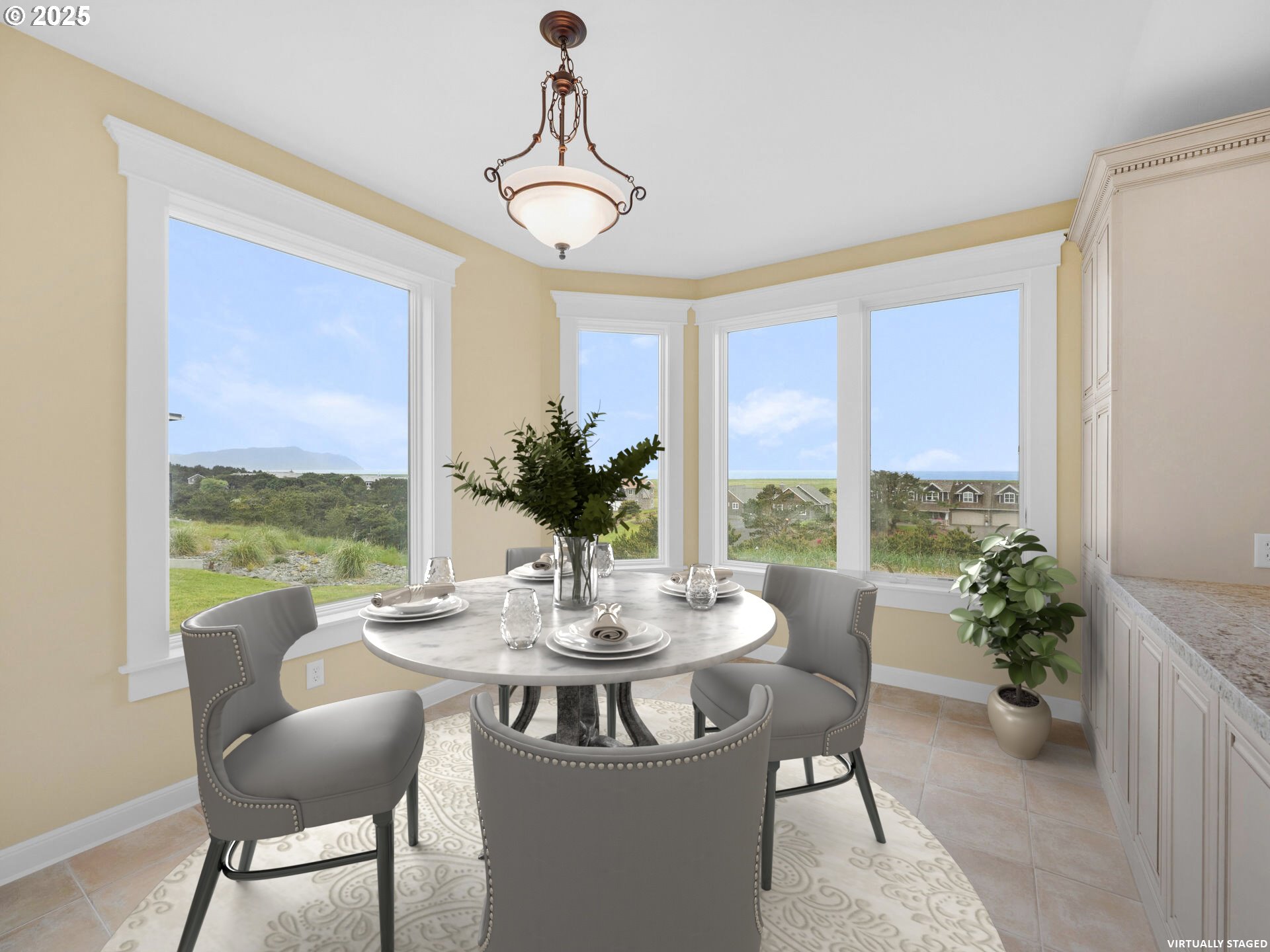 88902 Pinehurst Road Gearhart, OR 97138 - Photo 12 of 48 a view of a dining room with furniture window and wooden floor