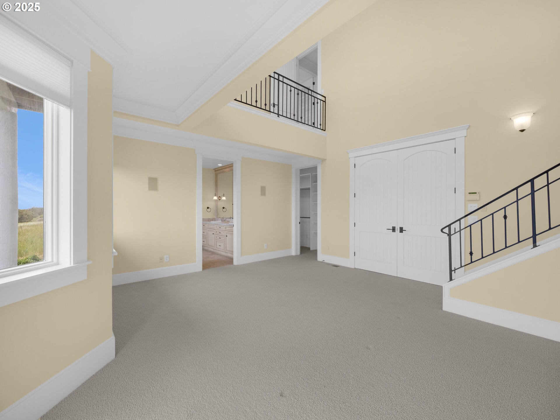 88902 Pinehurst Road Gearhart, OR 97138 - Photo 20 of 48 a view of an empty room with window and stairs