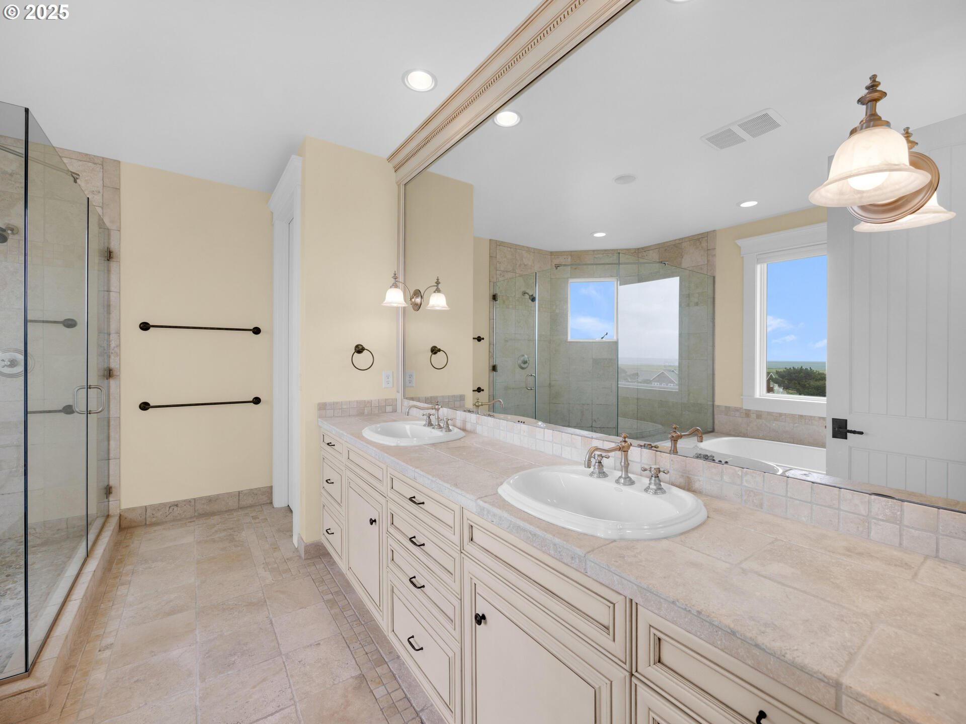 88902 Pinehurst Road Gearhart, OR 97138 - Photo 22 of 48 a bathroom with double sink and a mirror