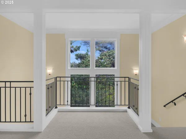 a view of a hallway with a large window