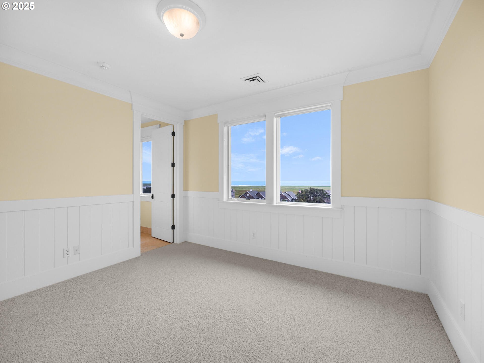 88902 Pinehurst Road Gearhart, OR 97138 - Photo 36 of 48 a view of an empty room with a window