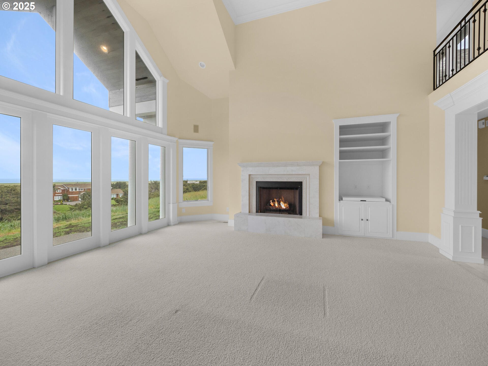 88902 Pinehurst Road Gearhart, OR 97138 - Photo 4 of 48 a view of an empty room with a fireplace and a window