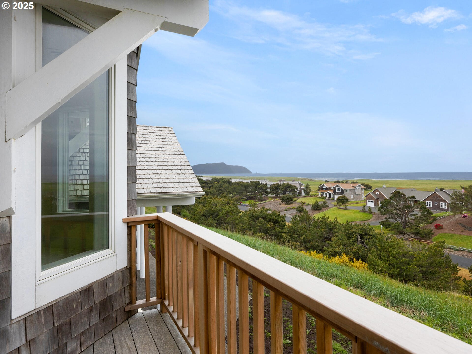 88902 Pinehurst Road Gearhart, OR 97138 - Photo 42 of 48 a view of a balcony with an ocean view