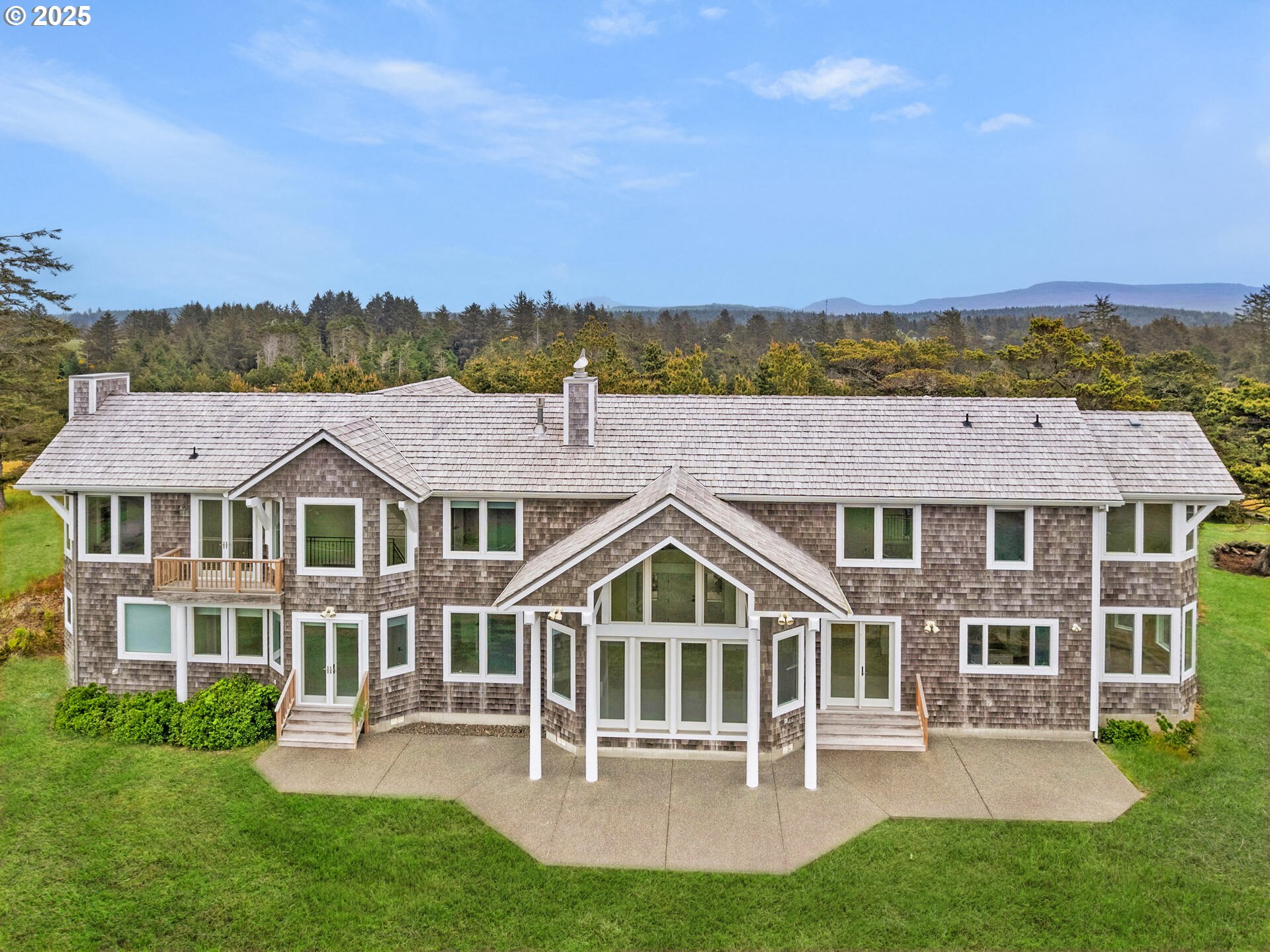 88902 Pinehurst Road Gearhart, OR 97138 - Photo 44 of 48 an aerial view of a house with a yard