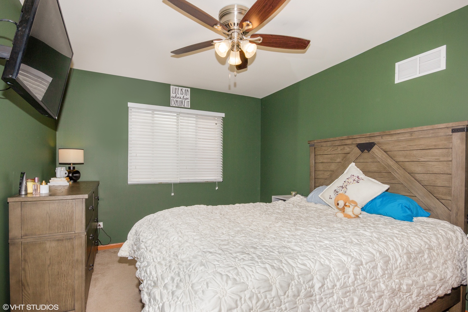 6315 Colton Ridge Court Plainfield, IL 60586 - Photo 11 of 15 a bedroom with a bed and a flat screen tv