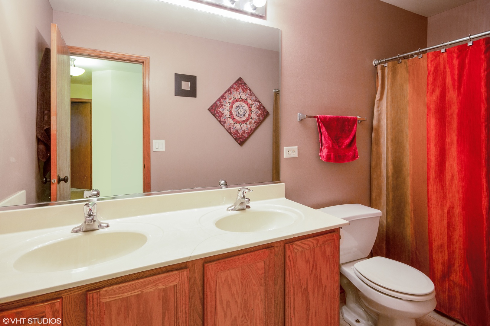 6315 Colton Ridge Court Plainfield, IL 60586 - Photo 13 of 15 a bathroom with a sink vanity mirror and toilet