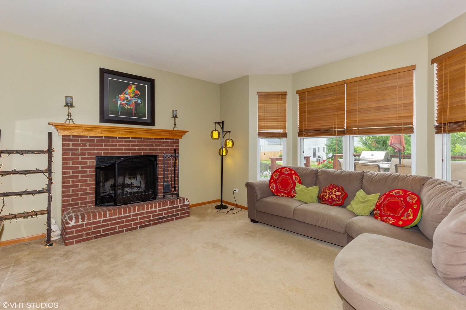 6315 Colton Ridge Court Plainfield, IL 60586 - Photo 5 of 15 a living room with furniture and a fireplace
