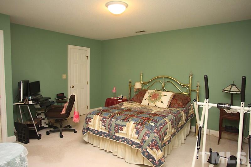 8314 Wycombe Lane Raleigh, NC 27615 - Photo 8 of 13 Master Bedroom with walk/in closet