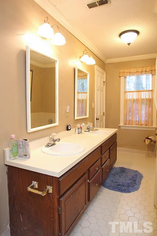 8314 Wycombe Lane Raleigh, NC 27615 - Photo 9 of 13 Master Bath offers shower and separate tub