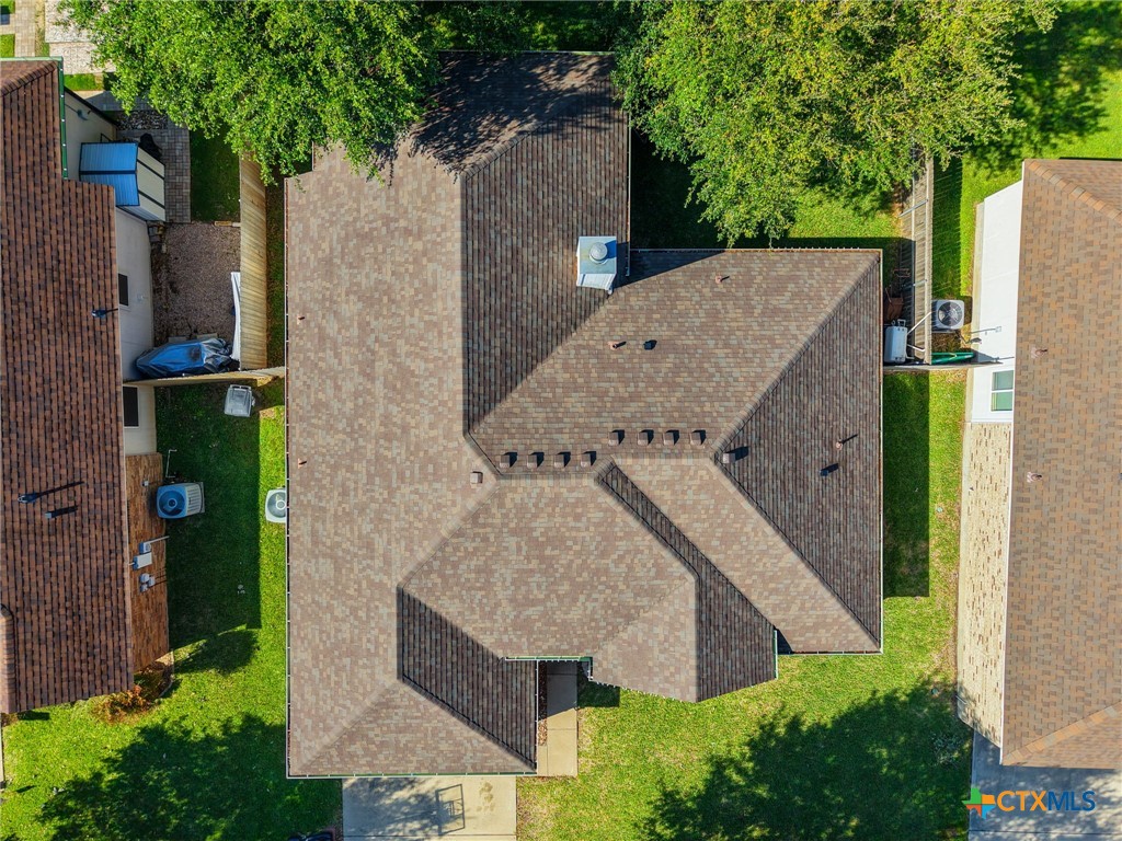 910 Neuberry Cliffe Temple, TX 76502 - Photo 30 of 32 aerial view of a house with a yard and large tree