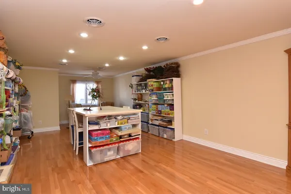 a room with furniture and a wooden floor