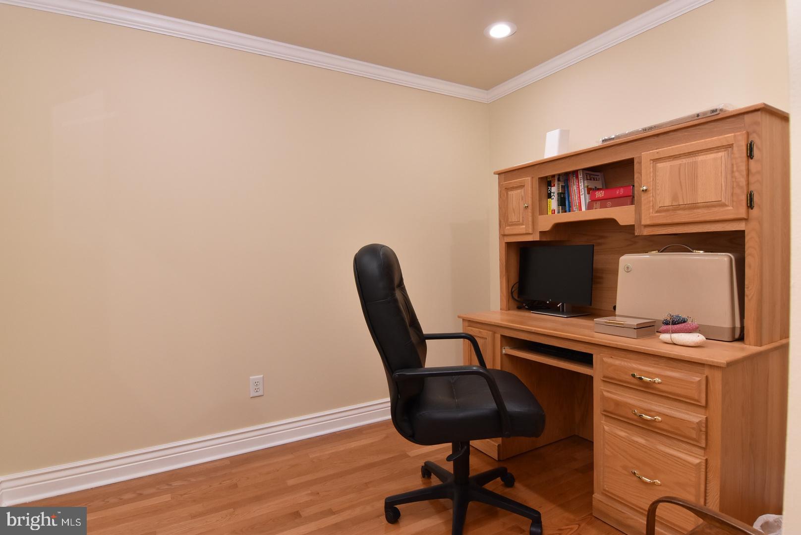 204 Turtle Cove, Unit 115 Laurel, DE 19956 - Photo 29 of 47 a view of a workspace with furniture