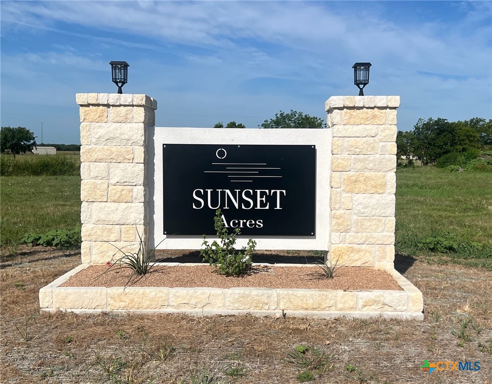8184 Evenfall Lane Temple, TX 76501 - Photo 6 of 7 a sign board on the side of a building