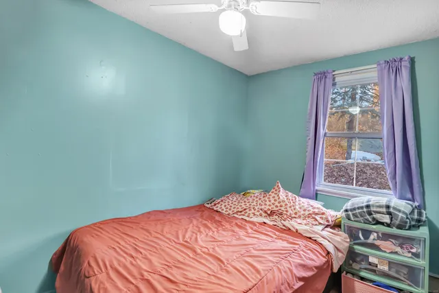 a room with a bed and a table