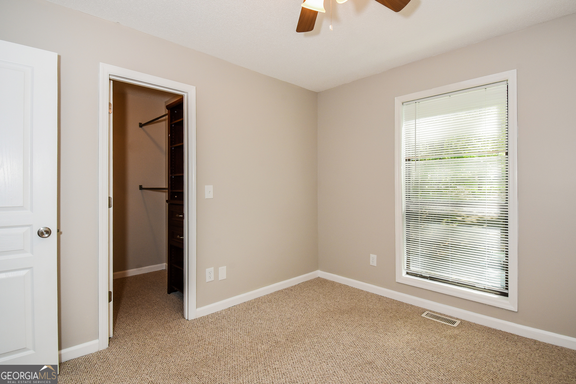 3970 Cripple Creek Drive Kennesaw, GA 30144 - Photo 12 of 17 an empty room with windows and closet