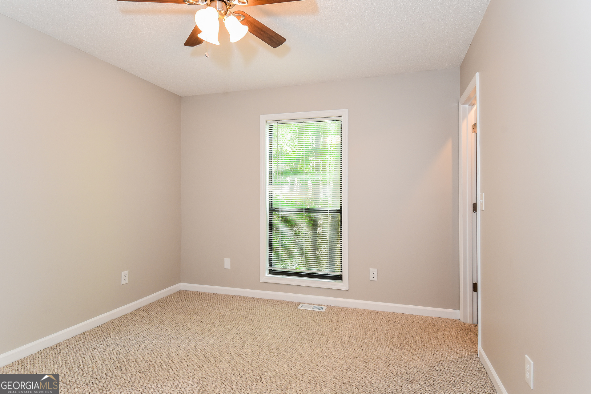 3970 Cripple Creek Drive Kennesaw, GA 30144 - Photo 13 of 17 an empty room with a window