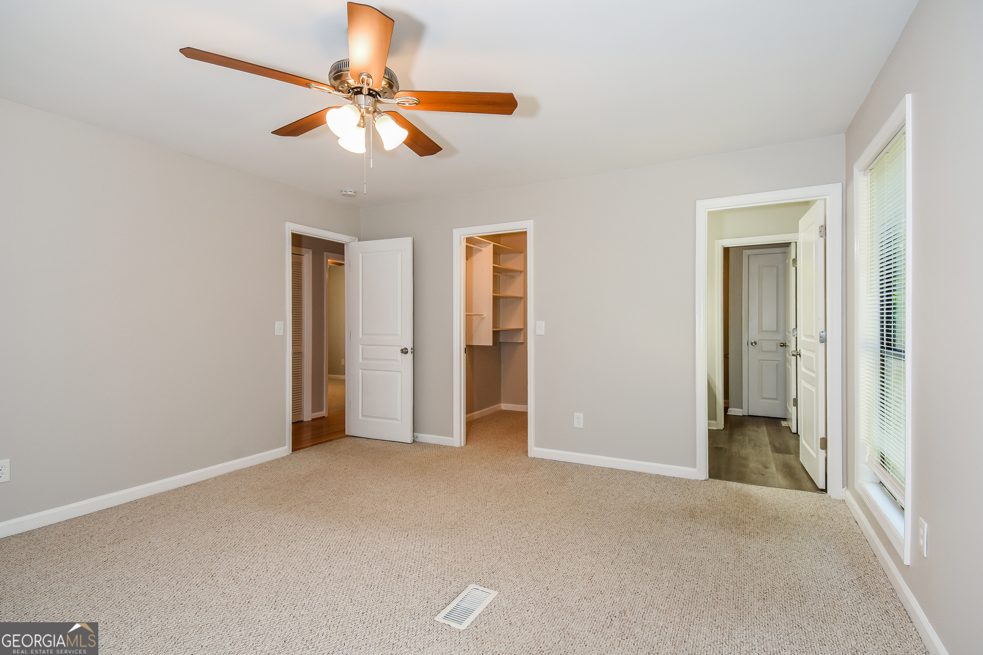 3970 Cripple Creek Drive Kennesaw, GA 30144 - Photo 10 of 17 a view of empty room with ceiling fan