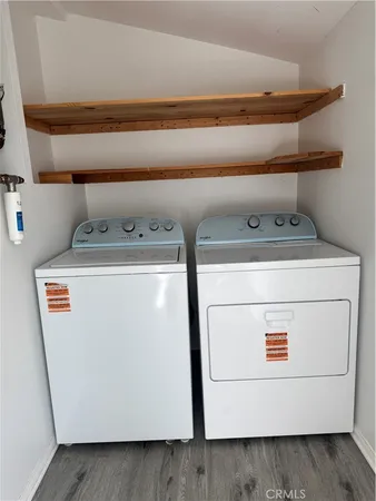 a utility room with washer and dryer