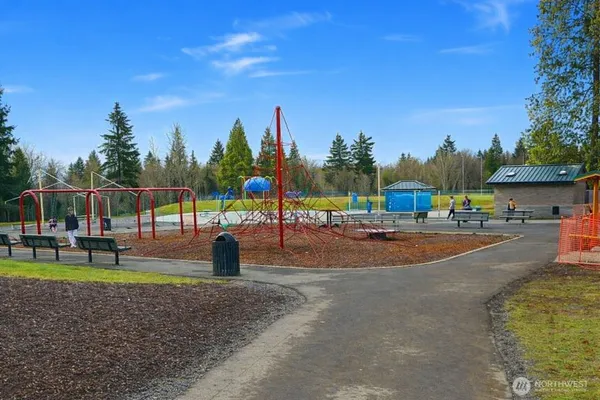 a view of a park with swings