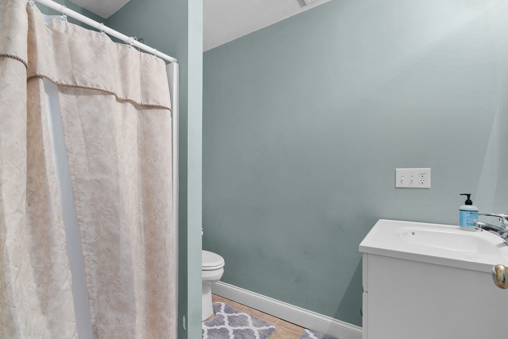 28 North Boulevard Wareham, MA 02558 - Photo 19 of 26 a bathroom with a sink and vanity