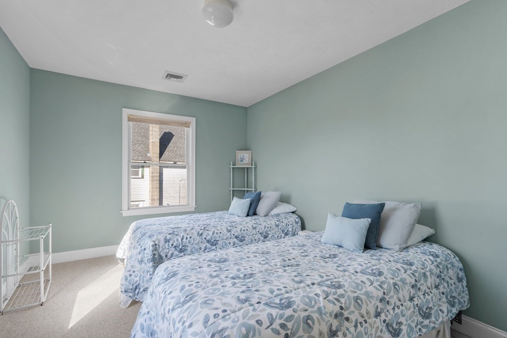 28 North Boulevard Wareham, MA 02558 - Photo 20 of 26 a bedroom with a bed and a window