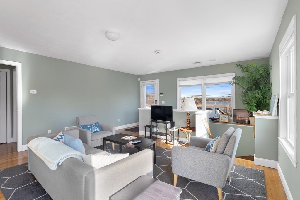 28 North Boulevard Wareham, MA 02558 - Photo 6 of 26 a living room with furniture and a large window