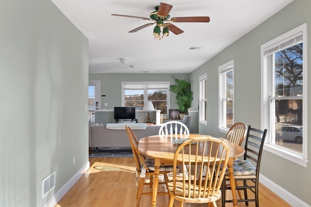28 North Boulevard Wareham, MA 02558 - Photo 9 of 26 a view of a dining room with furniture window and wooden floor