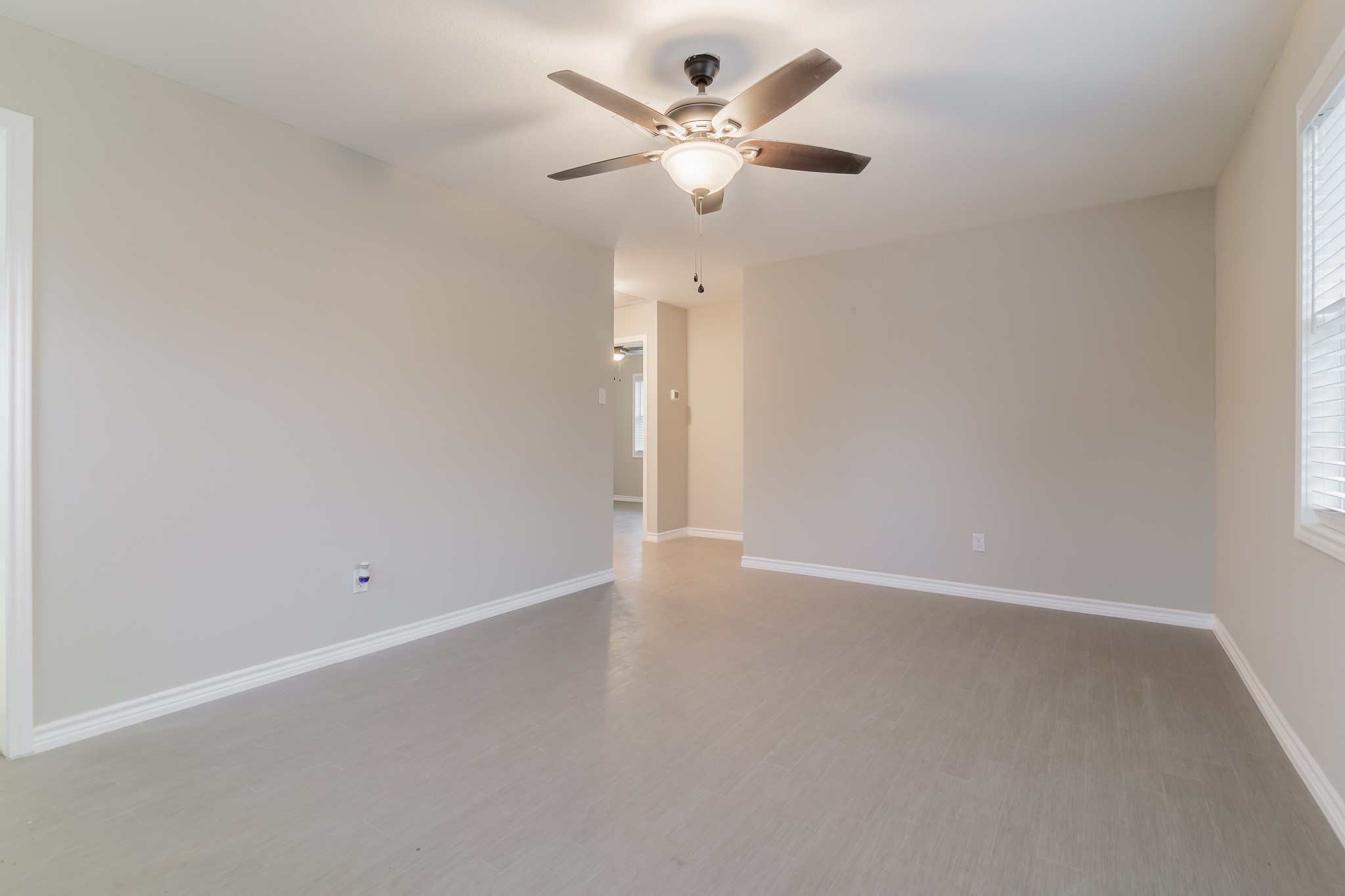 101 Will Street Willis, TX 77378 - Photo 20 of 25 wooden floor in an empty room