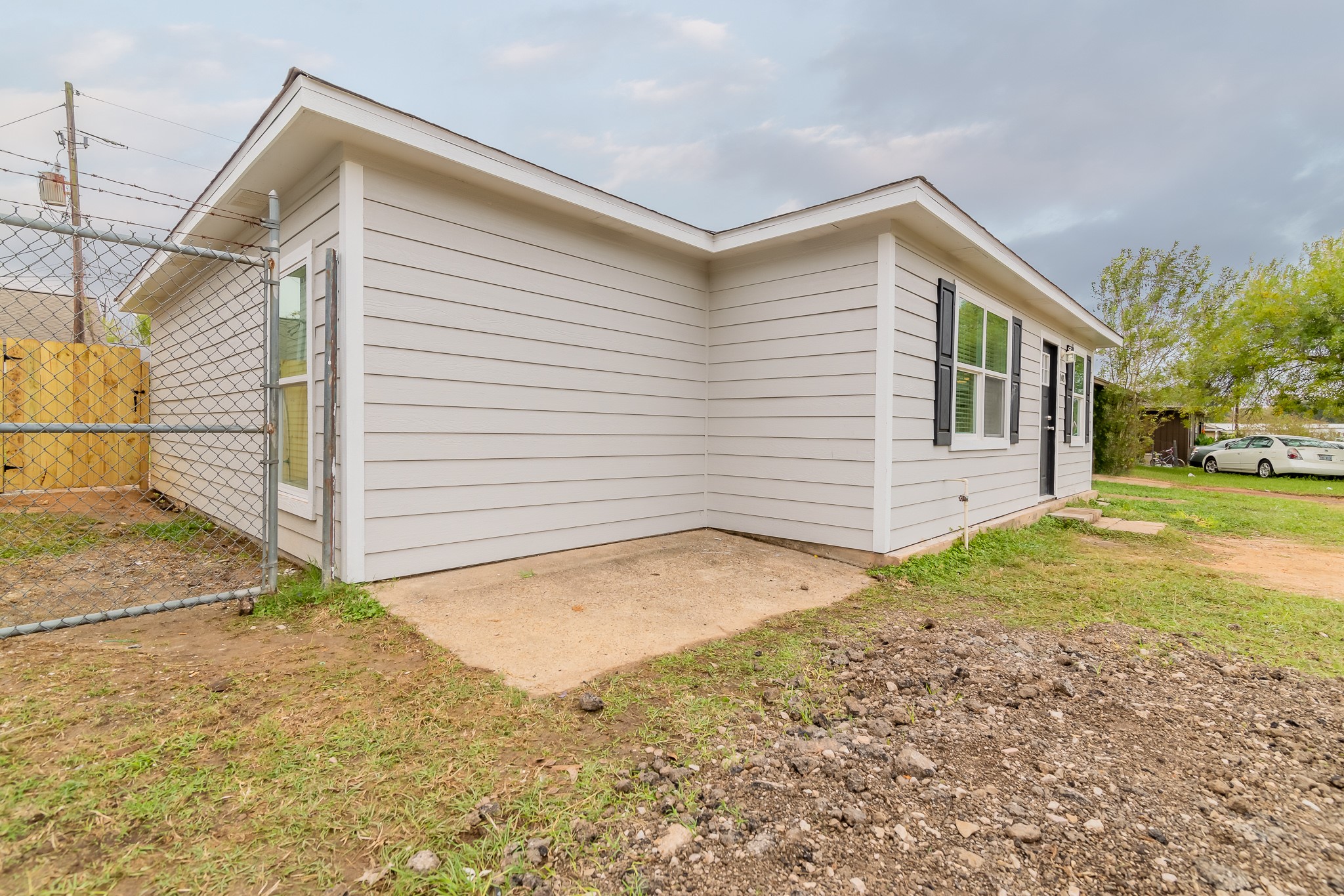 101 Will Street Willis, TX 77378 - Photo 25 of 25 a view of a house with a yard