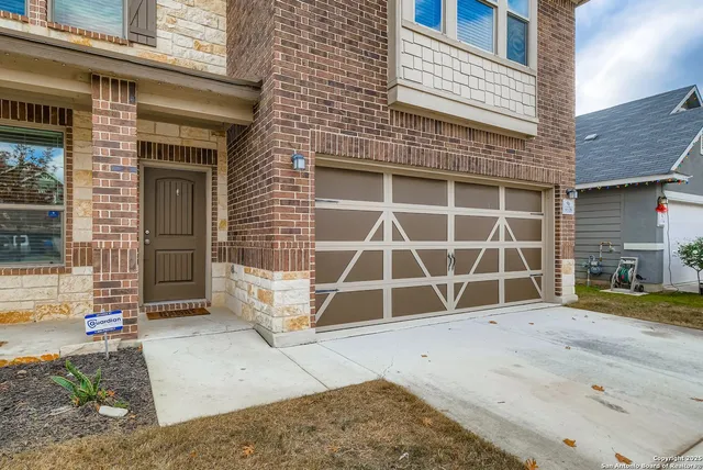 a view of a house with a parking space