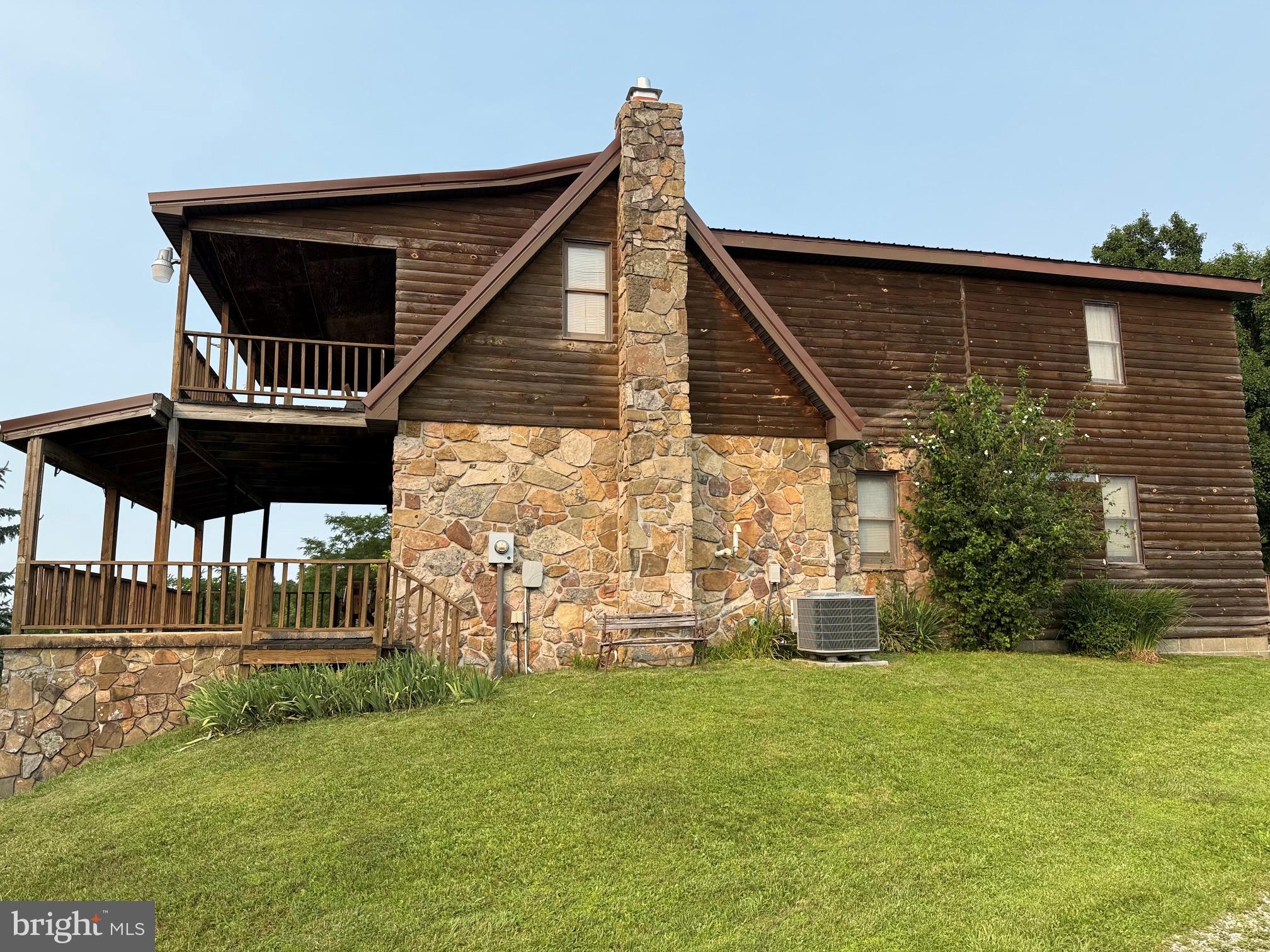 1492 Dice Warner Road Circleville, WV 26804 - Photo 24 of 36 Charming rustic home with stone accents.