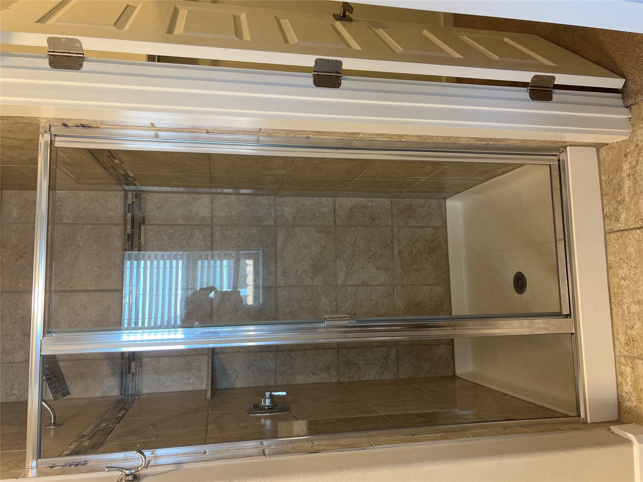 7009 Sienna Rouge Path Austin, TX 78744 - Photo 11 of 29 Full bathroom featuring a stall shower