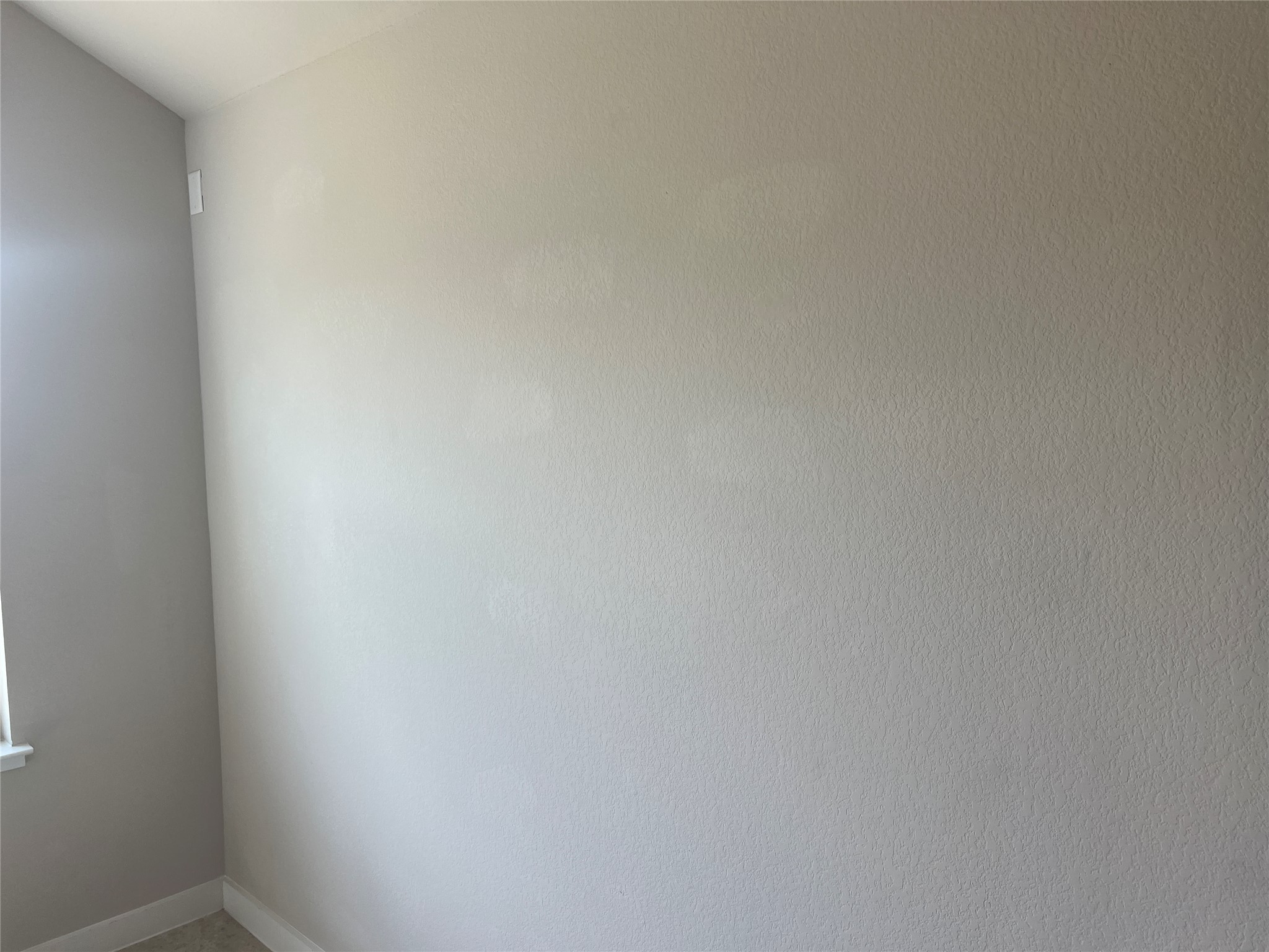 7009 Sienna Rouge Path Austin, TX 78744 - Photo 28 of 29 Unfurnished room featuring baseboards
