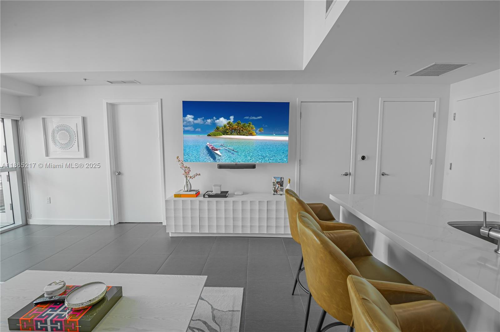 3301 Northeast 1st Avenue, Unit M0703 Miami, FL 33137 - Photo 30 of 48 a living room with furniture and a flat screen tv