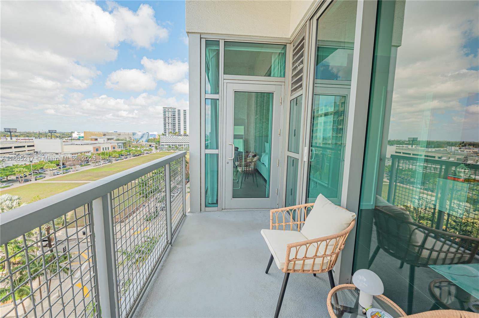 3301 Northeast 1st Avenue, Unit M0703 Miami, FL 33137 - Photo 34 of 48 a balcony with table and chairs