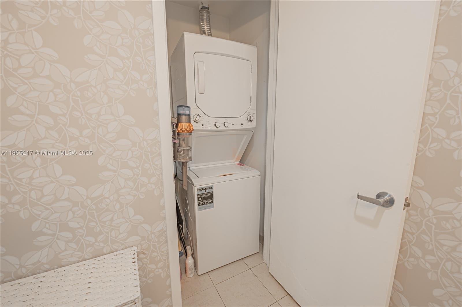 3301 Northeast 1st Avenue, Unit M0703 Miami, FL 33137 - Photo 37 of 48 a bathroom with a granite countertop toilet and a sink