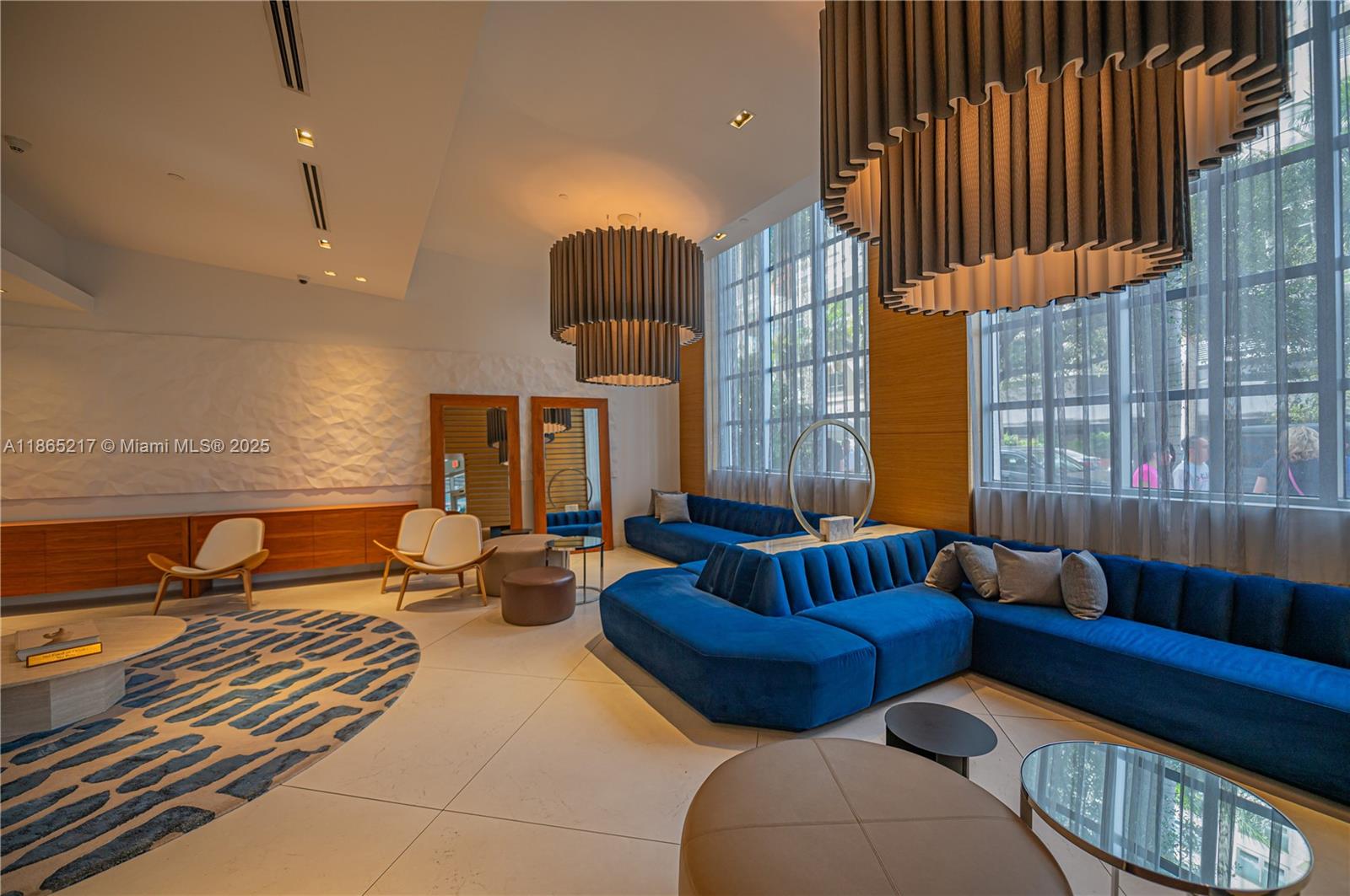 3301 Northeast 1st Avenue, Unit M0703 Miami, FL 33137 - Photo 6 of 48 a living room with furniture a couch and a fireplace