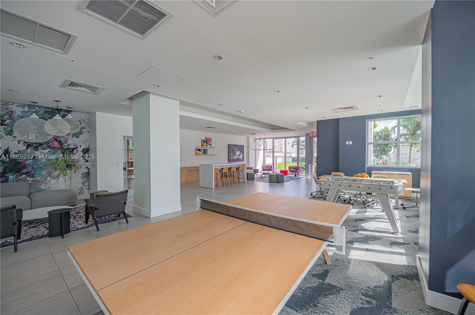 3301 Northeast 1st Avenue, Unit M0703 Miami, FL 33137 - Photo 9 of 48 a room with patio furniture and a large window