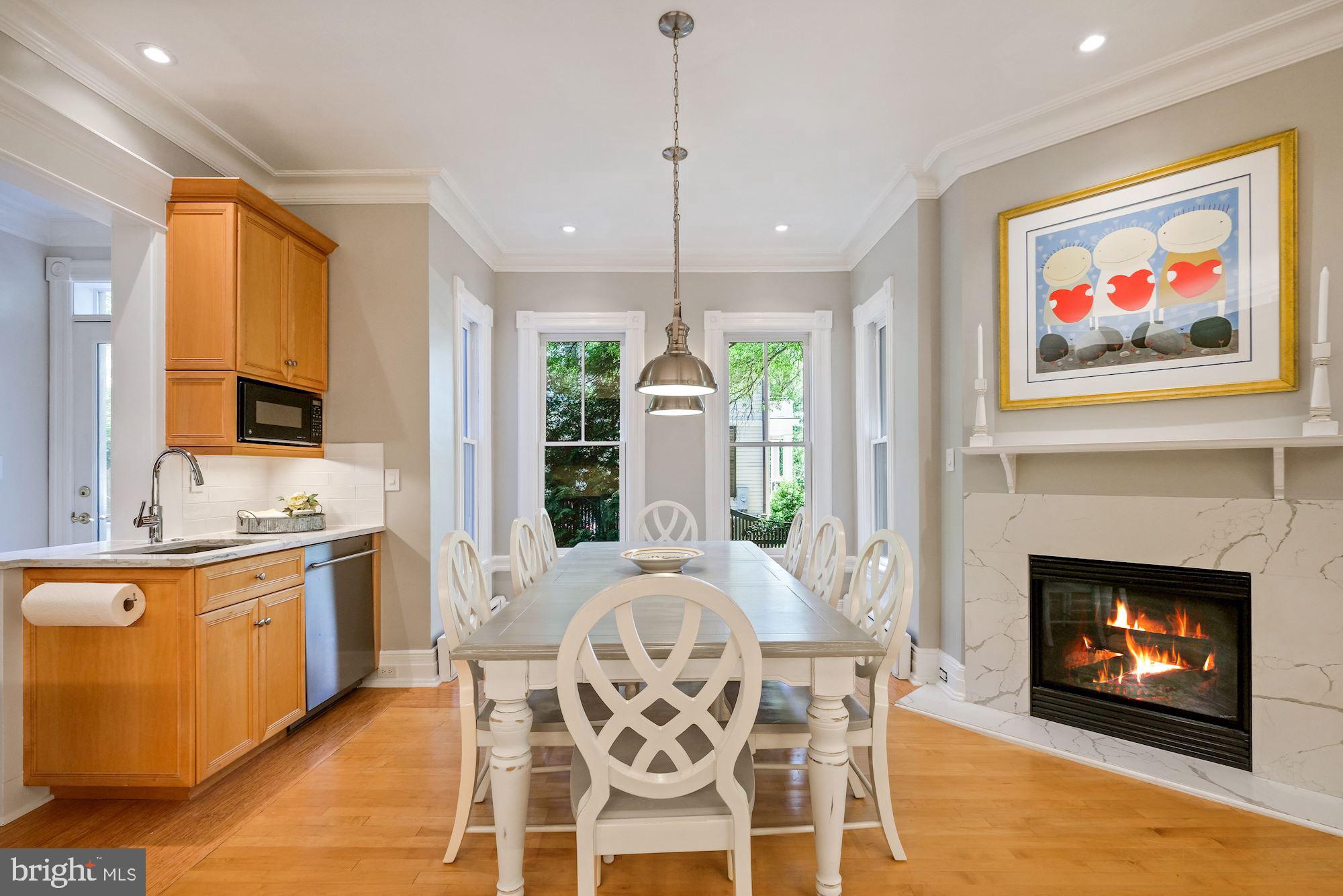 3115 Foxhall Road Northwest Washington, DC 20016 - Photo 31 of 80 Breakfast room with gas fireplace