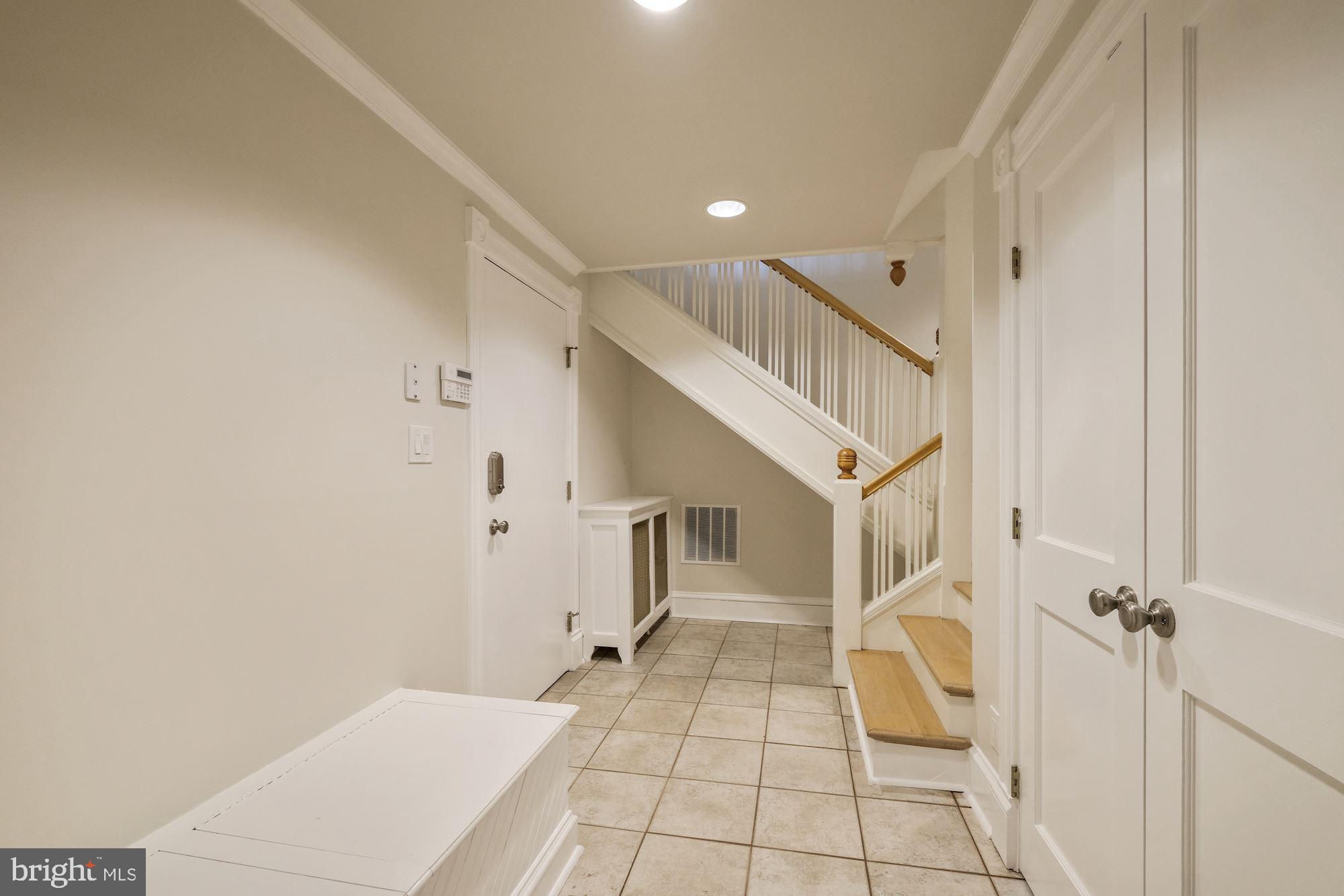 3115 Foxhall Road Northwest Washington, DC 20016 - Photo 76 of 80 Mudroom with heated towel rack and CA closet