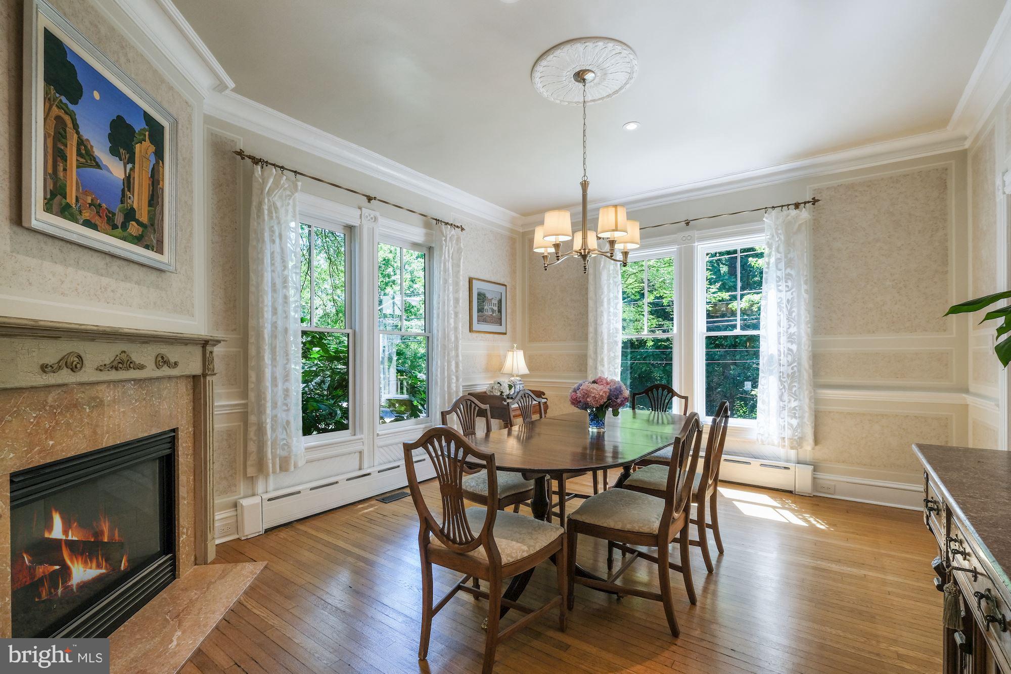 3115 Foxhall Road Northwest Washington, DC 20016 - Photo 10 of 80 Gas fireplace in light-filled dining room