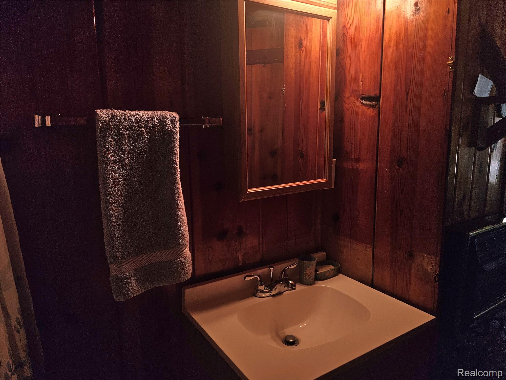 4682 Port Austin Road Caseville, MI 48725 - Photo 11 of 21 Bathroom featuring vanity.