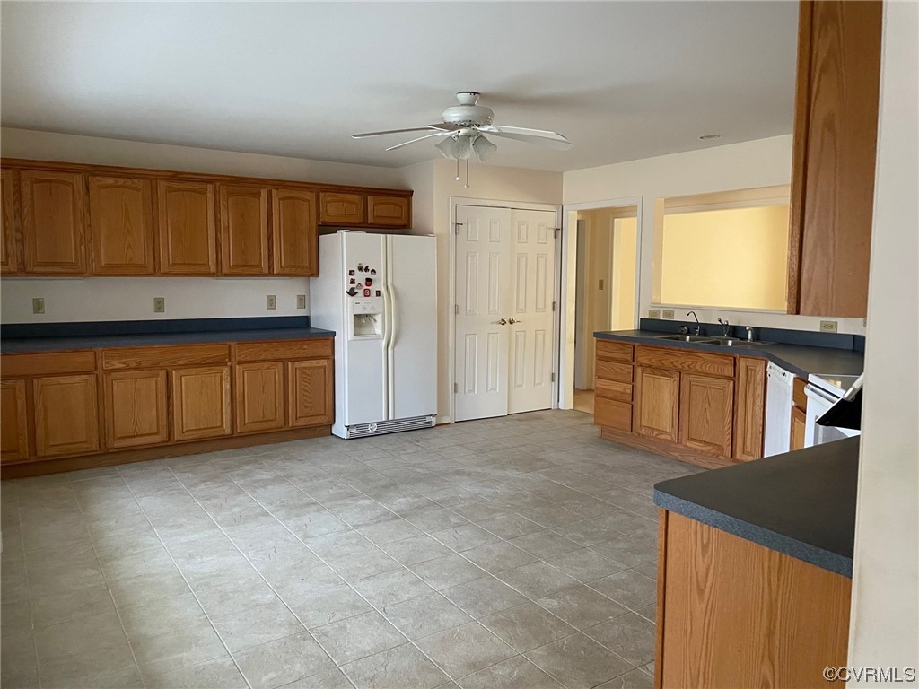 17512 Circuit Rider Drive Beaverdam, VA 23015 - Photo 6 of 19 a view of a kitchen with a sink cabinets and a window