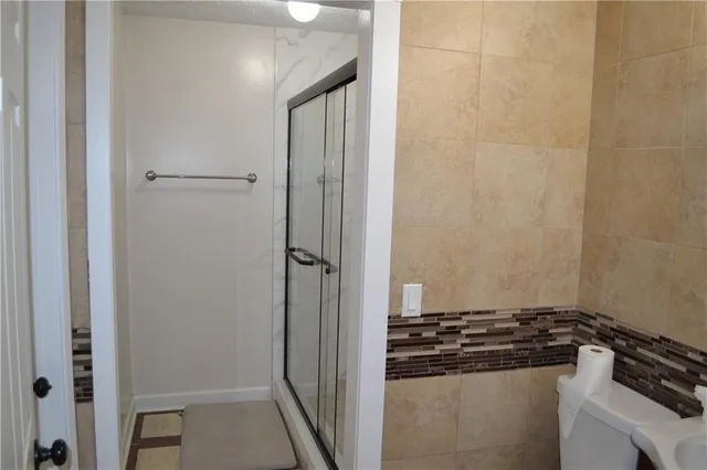 a view of a utility room with washer and dryer