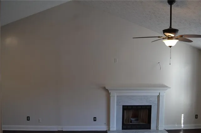 a view of a livingroom with a fireplace