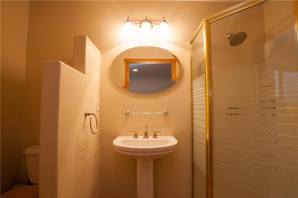 89 N Road Silverthorne, CO 80498 - Photo 20 of 35 a bathroom with a sink and mirror