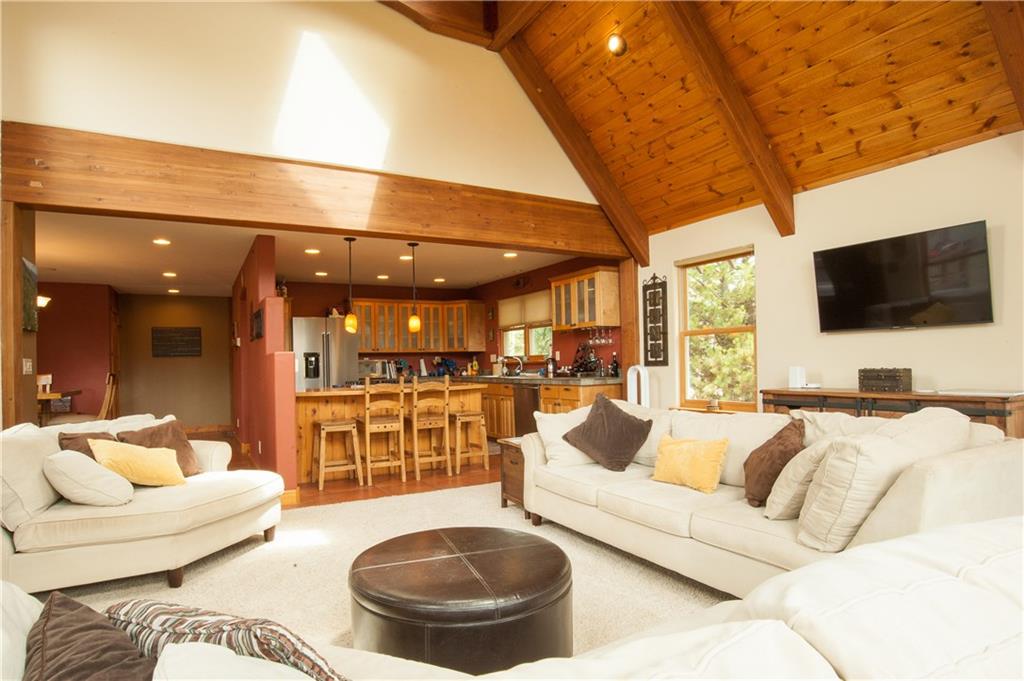 89 N Road Silverthorne, CO 80498 - Photo 3 of 35 a living room with furniture and a flat screen tv