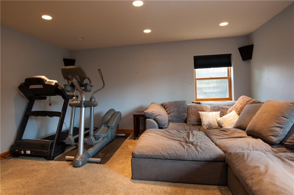 89 N Road Silverthorne, CO 80498 - Photo 21 of 35 a living room with furniture gym equipment and a window