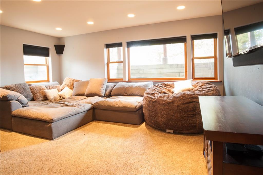 89 N Road Silverthorne, CO 80498 - Photo 22 of 35 a living room with furniture and a large window